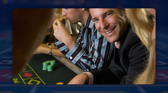 Laughing man at roulette table
