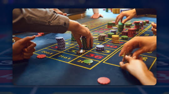 Placing bets at roulette table